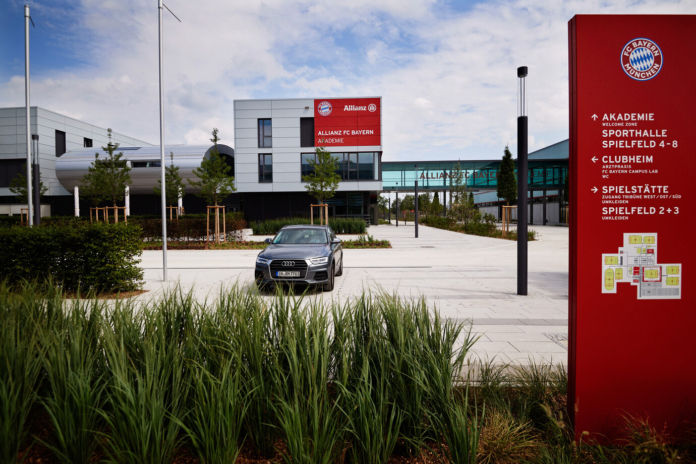 view from the entrance area of the FC Bayern Campus towards the academy building