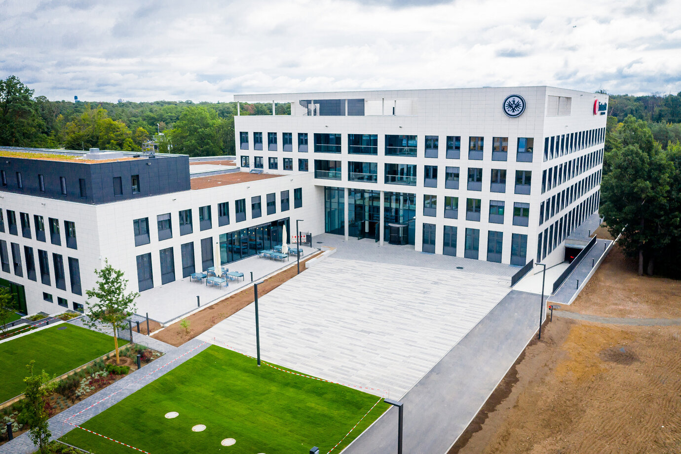 Forecourt of new office and ProfiCamp | Main entrance