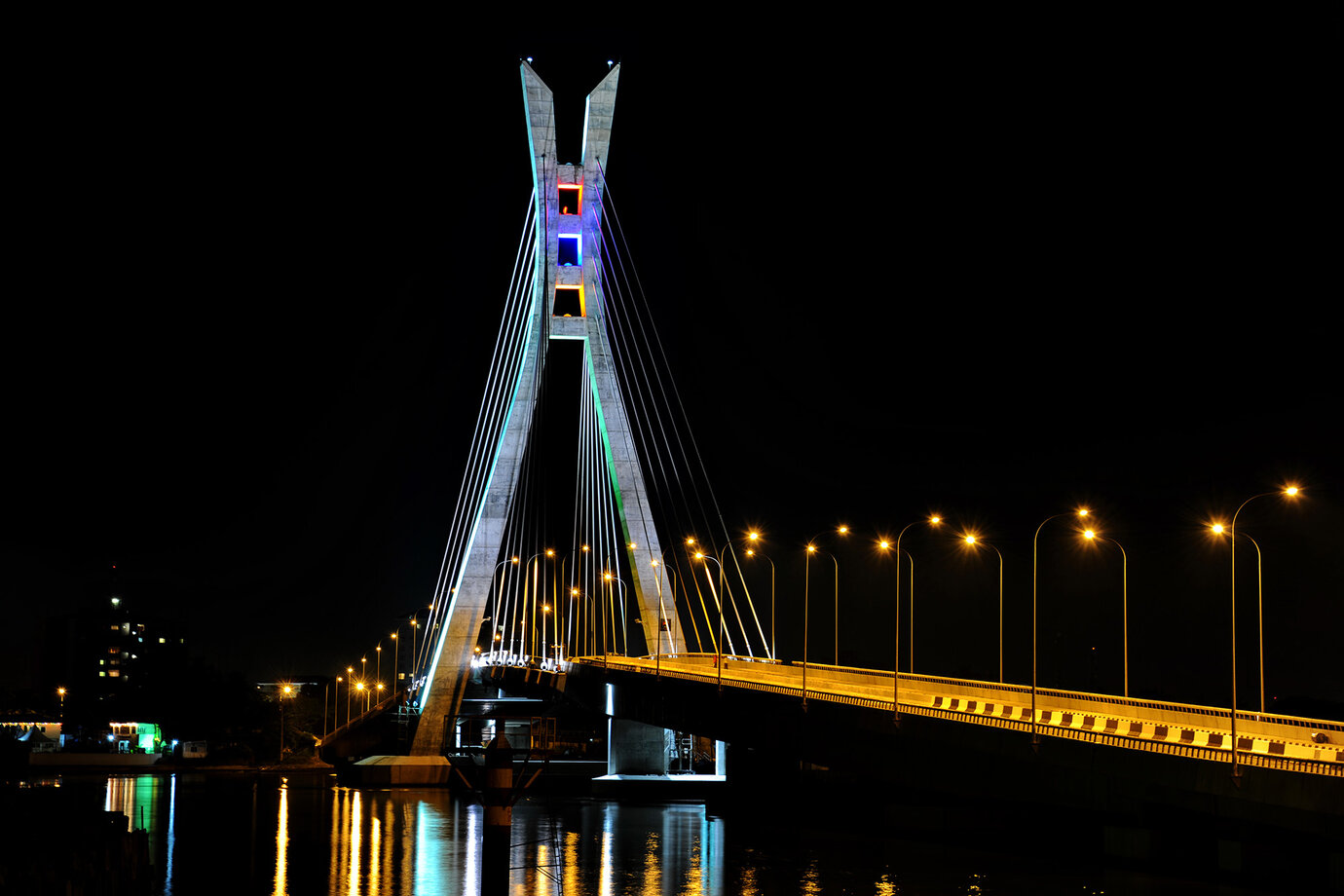 Illuminated Lekki-Ikoyi Link Bridge at night / © Julius Berger Nigeria Plc